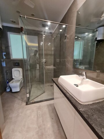 Bathroom in 4 BHK Builder Floor at Ansal Sushant Lok I, Sector 43 – for Rent