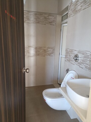 Bathroom in 1 BHK Apartment at JVM Corner Stone, Naupada – for Sale