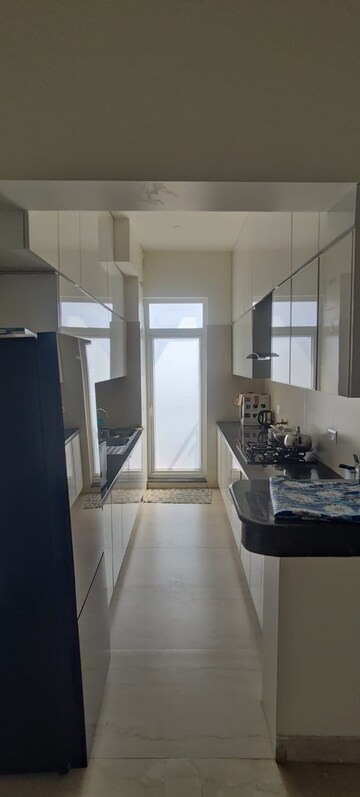 Kitchen in 2.5 BHK Apartment at Microtek Greenburg, Sector 86 – for Rent