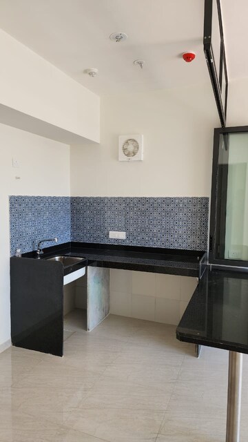 Kitchen in 1 BHK Apartment at Lodha Crown Quality Homes, Majiwada – for Sale