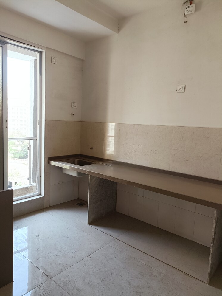 Kitchen, rosa-manhattan 2 Bedroom 754 Sq.Ft. Apartment In Ghodbunder Road Thane 8300856