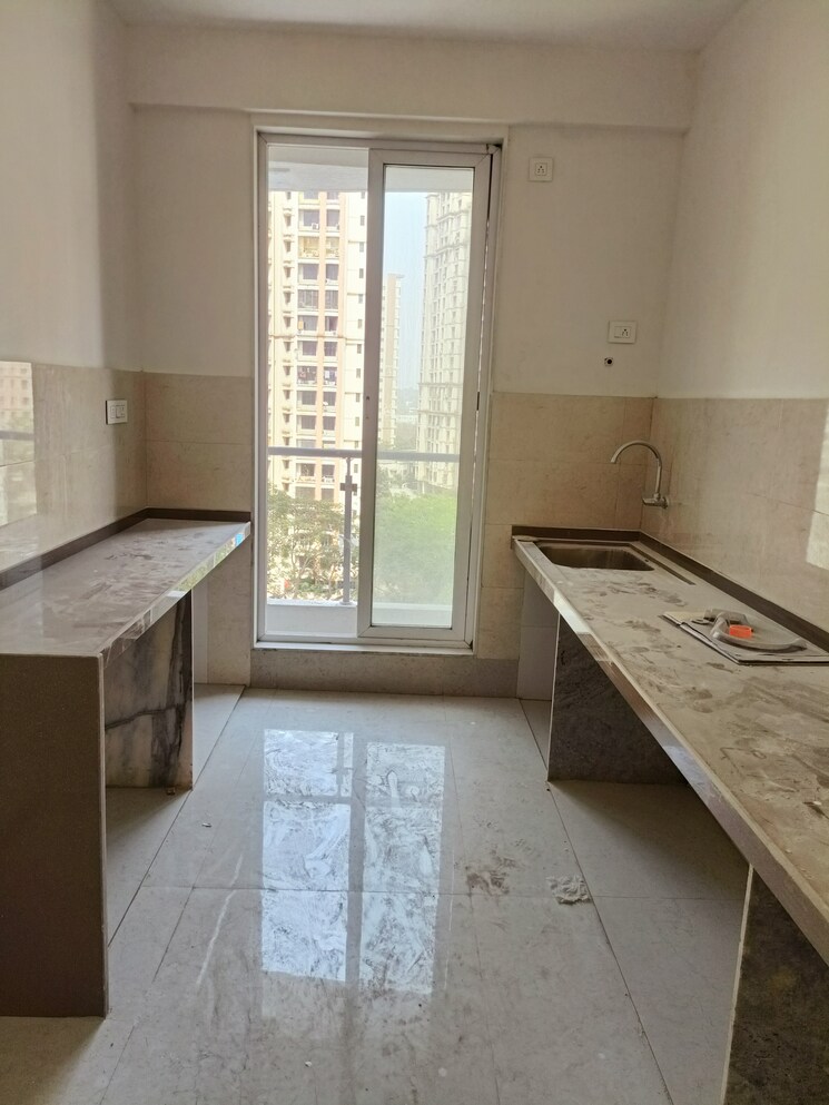 Kitchen, rosa-manhattan 3 Bedroom 1023 Sq.Ft. Apartment In Ghodbunder Road Thane 8300866