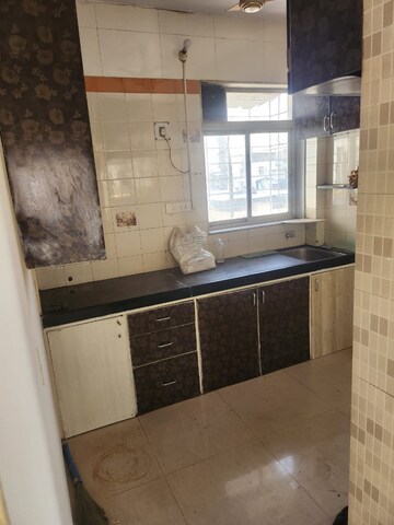 Kitchen in 1 BHK Apartment at Avneesh Apartment, Sector 13 – for Rent