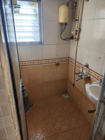 Bathroom in 1 BHK Apartment at Avneesh Apartment, Sector 13 – for Rent