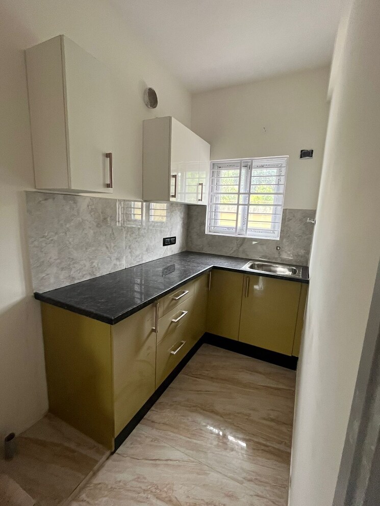Kitchen, reliaable-elegaance 1.5 Bedroom 700 Sq.Ft. Apartment In Huskur Bangalore 8300921