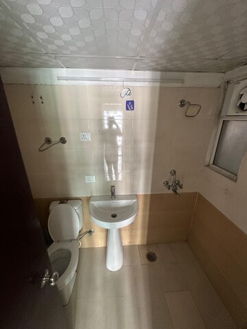 Bathroom in 2 BHK Apartment at Windsor Paradise 2, Raj Nagar Extension – for Sale