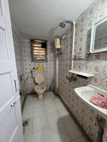 Bathroom in 2 BHK Apartment at Nestle Apartment, Andheri West – for Rent