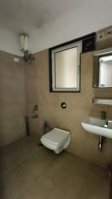 Bathroom in 2 BHK Apartment at Puranik Rumah Bali, Ghodbunder Road – for Rent