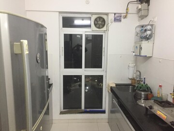 Kitchen in 1.5 BHK Apartment at Godrej Emerald, Ghodbunder Road – for Rent