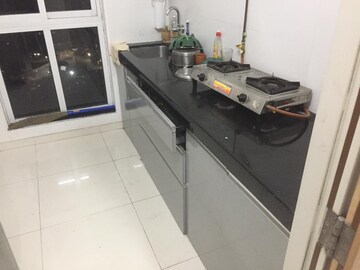 Kitchen in 1.5 BHK Apartment at Godrej Emerald, Ghodbunder Road – for Rent