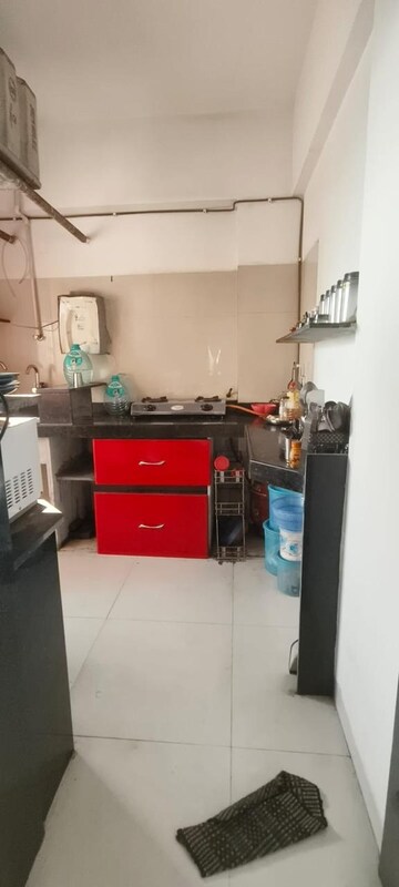 Kitchen in 1 BHK Apartment at RDC Woods Teakwoods, Ghodbunder Road – for Rent