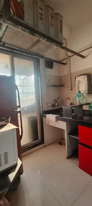 Kitchen in 1 BHK Apartment at RDC Woods Teakwoods, Ghodbunder Road – for Rent