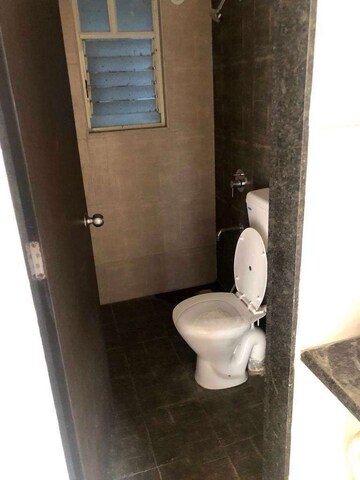 Bathroom in 2 BHK Apartment at Mantra Insignia, Mundhwa – for Rent
