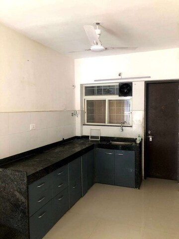 Kitchen in 2 BHK Apartment at Mantra Insignia, Mundhwa – for Rent