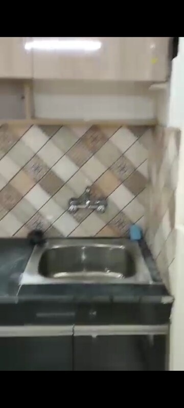 Kitchen in 2 BHK Apartment at Nilaya Greens, Raj Nagar Extension – for Rent