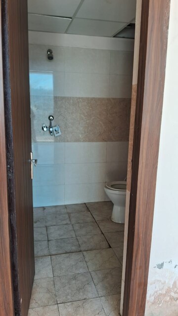 Bathroom in 2 BHK Apartment at Amrapali Golf Homes, Sector 4, Greater Noida – for Rent
