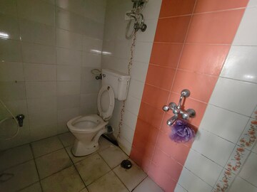 Bathroom in 2 BHK Apartment at Riddhi Gardens CHS, Malad East – for Rent