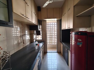 Kitchen in 2 BHK Apartment at Riddhi Gardens CHS, Malad East – for Rent