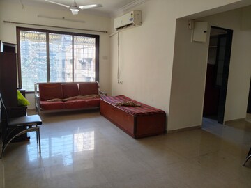 Living Room in 2 BHK Apartment at Riddhi Gardens CHS, Malad East – for Rent