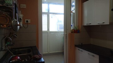 Room in 2 BHK Apartment at Paradigm Business Hermitage Park, Dhakoli Village – for Sale
