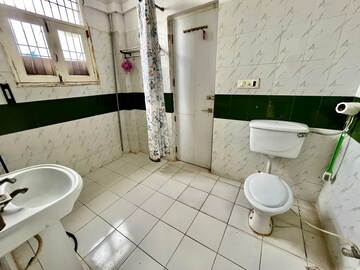 Bathroom in 3 BHK Apartment at US Pine Homes, Dhakoli Village – for Sale
