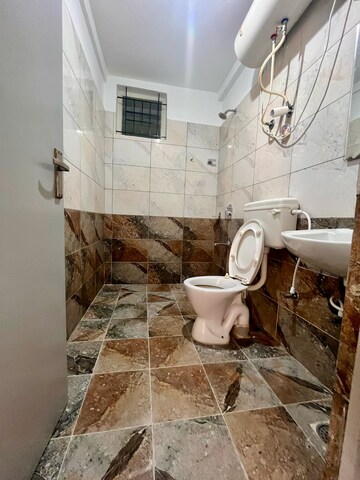 Bathroom in 2 BHK Apartment at SR Manor, Cv Raman Nagar – for Rent