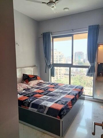 Bedroom in 2 BHK Apartment at Evershine Grandeur, Malad West – for Rent