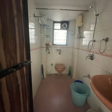 Bathroom in 2 BHK Apartment at Sadguru Complex I, Umershetpada – for Sale