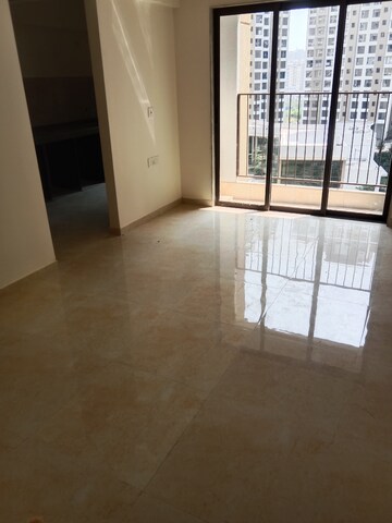 Living Room in 1 BHK Apartment at Sunteck Maxxworld, Naigaon East – for Rent