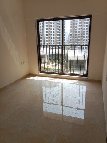 Master Bedroom in 1 BHK Apartment at Sunteck Maxxworld, Naigaon East – for Rent