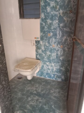 Bathroom in 1 BHK Apartment at Shree Krishna Heights Juchandra, Naigaon East – for Rent