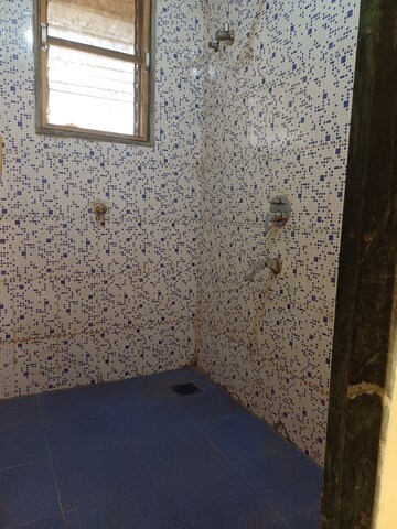 Bathroom in 1 BHK Apartment at Megh Malhar Co-op Housing Society, Ghansoli – for Rent
