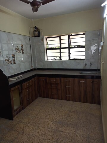 Kitchen in 2 BHK Apartment at Madhumita Apartment Gururaj Society, Kothrud – for Rent