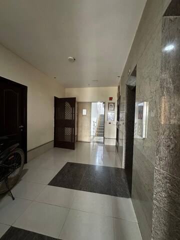 Building Lobby in 2 BHK Apartment at Unitech Uniworld Gardens 2, Sector 47 – for Rent