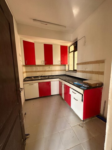 Kitchen in 2 BHK Apartment at Unitech Uniworld Gardens 2, Sector 47 – for Rent