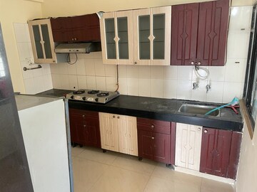 Kitchen in 3 BHK Apartment at Gulmohar Orchids, Kharadi – for Rent