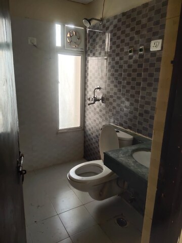 Bathroom in 4 BHK Apartment at Antriksh Golf View, Sector 78 – for Rent