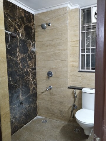 Bathroom in 2 BHK Apartment at Unitech Uniworld Gardens 2, Sector 47 – for Sale