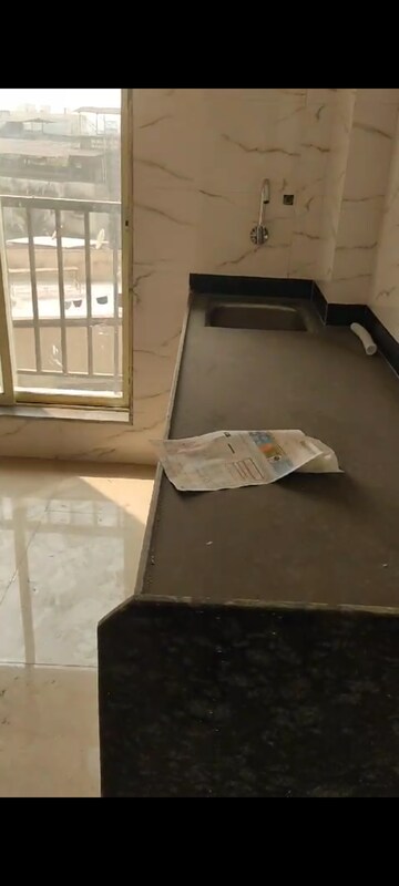 Kitchen in 1 BHK Apartment at Parasnath Nagari, Naigaon East – for Rent