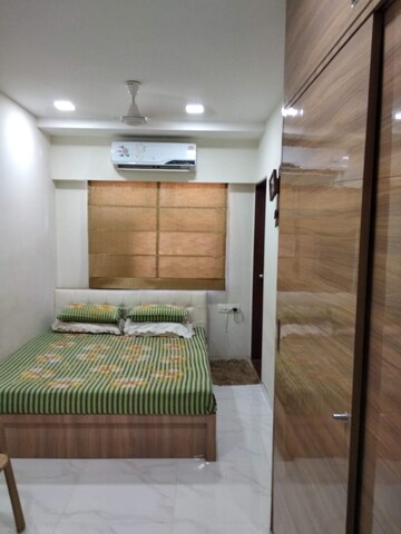 Bedroom in 2 BHK Apartment at Om Sai CHS Andheri West, Andheri West – for Rent
