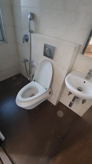 Bathroom in 2 BHK Apartment at Prime CHS, Mulund East – for Rent