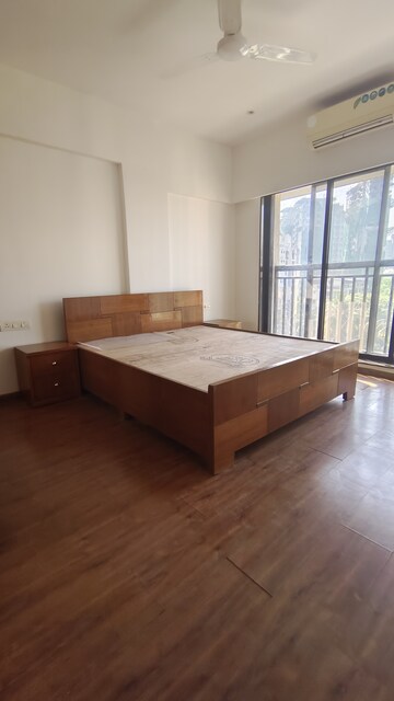 Bedroom in 2 BHK Apartment at Prime CHS, Mulund East – for Rent