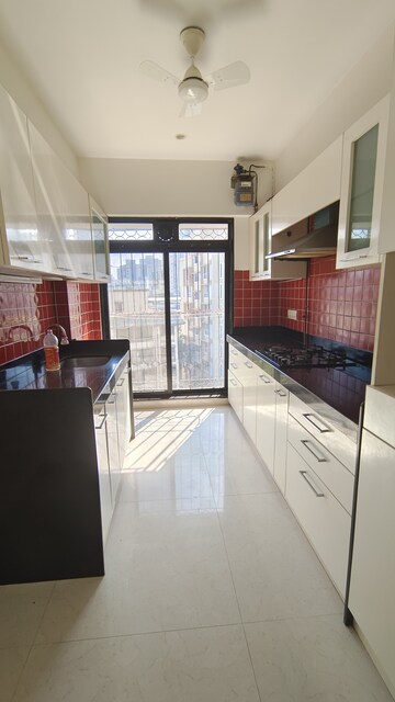 Kitchen in 2 BHK Apartment at Prime CHS, Mulund East – for Rent