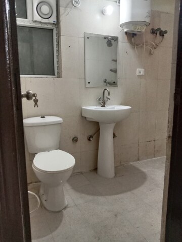 Bathroom in 3 BHK Apartment at Antriksh Golf View, Sector 78 – for Rent