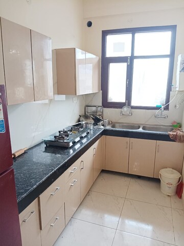Kitchen in 3 BHK Apartment at Dhakoli Village – for Rent