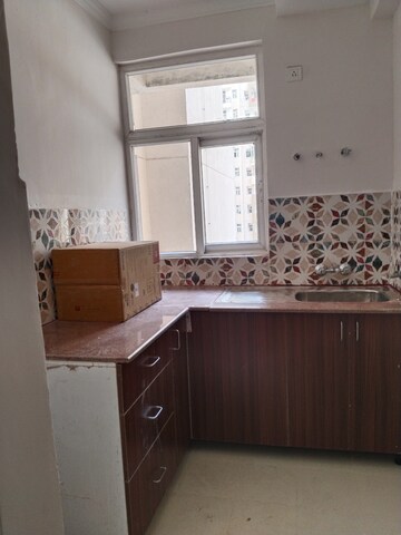 Kitchen in 2 BHK Apartment at Amrapali Leisure Park, Amrapali Leisure Valley – for Rent