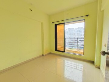 Room in 2 BHK Apartment at Rustomjee Global City – for Sale