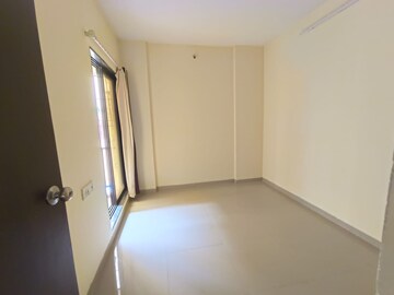 Bedroom in 2 BHK Apartment at Rustomjee Global City – for Sale