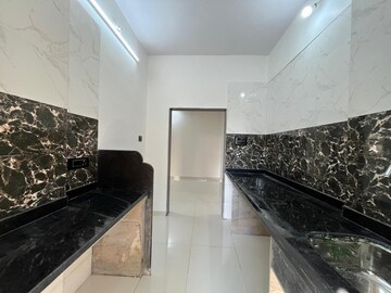 Kitchen in 2 BHK Apartment at Dombivli West – for Sale