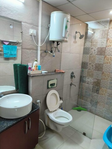 Bathroom in 3 BHK Apartment at Gaur Sportswood, Sector 79 – for Rent